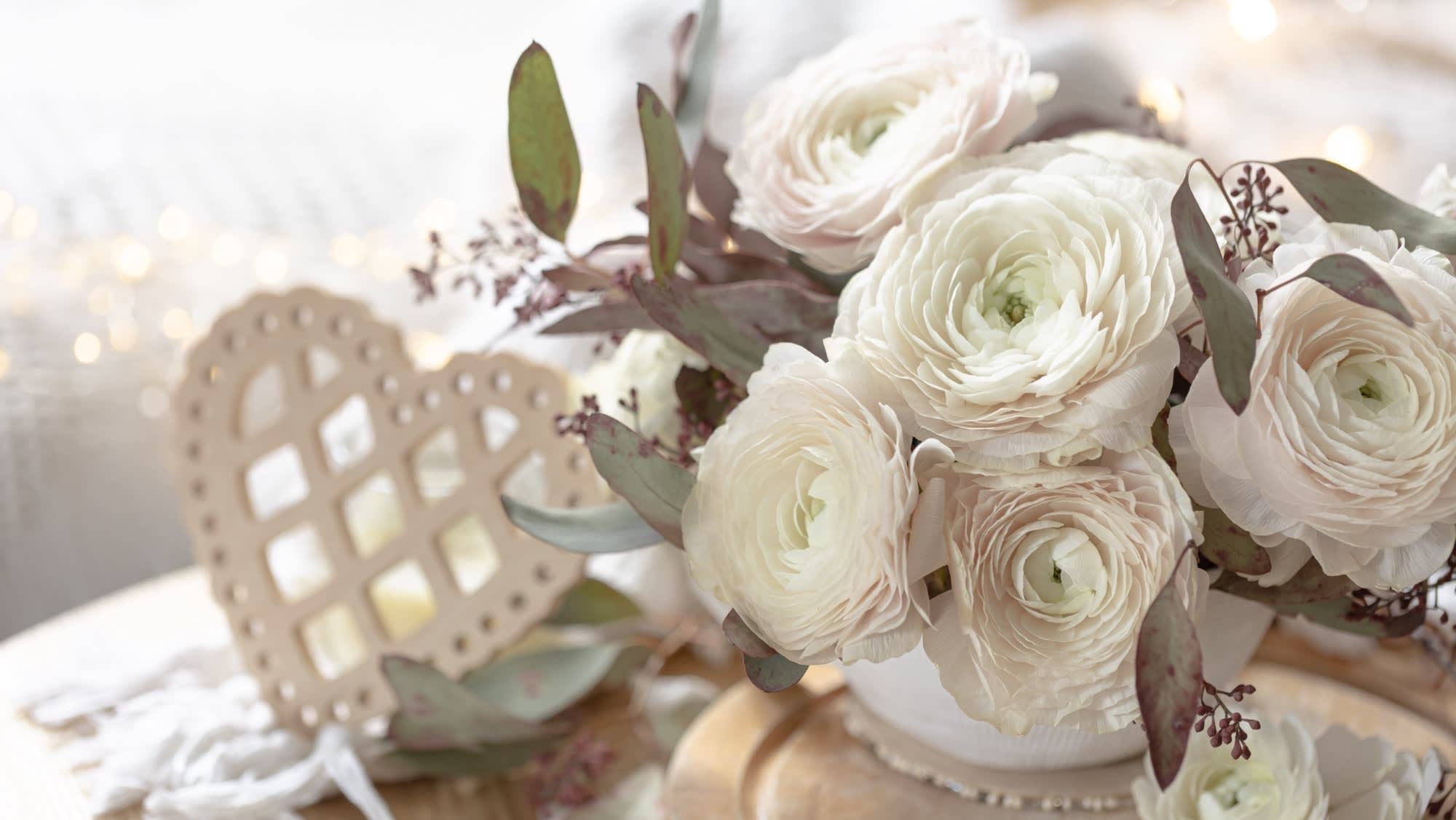 bouquet-white-ranunculus-flowers-blurred-background-with-heart