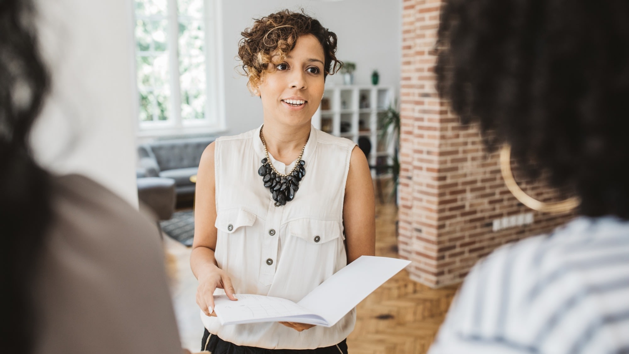 iStock-987181590 - woman with business proposal