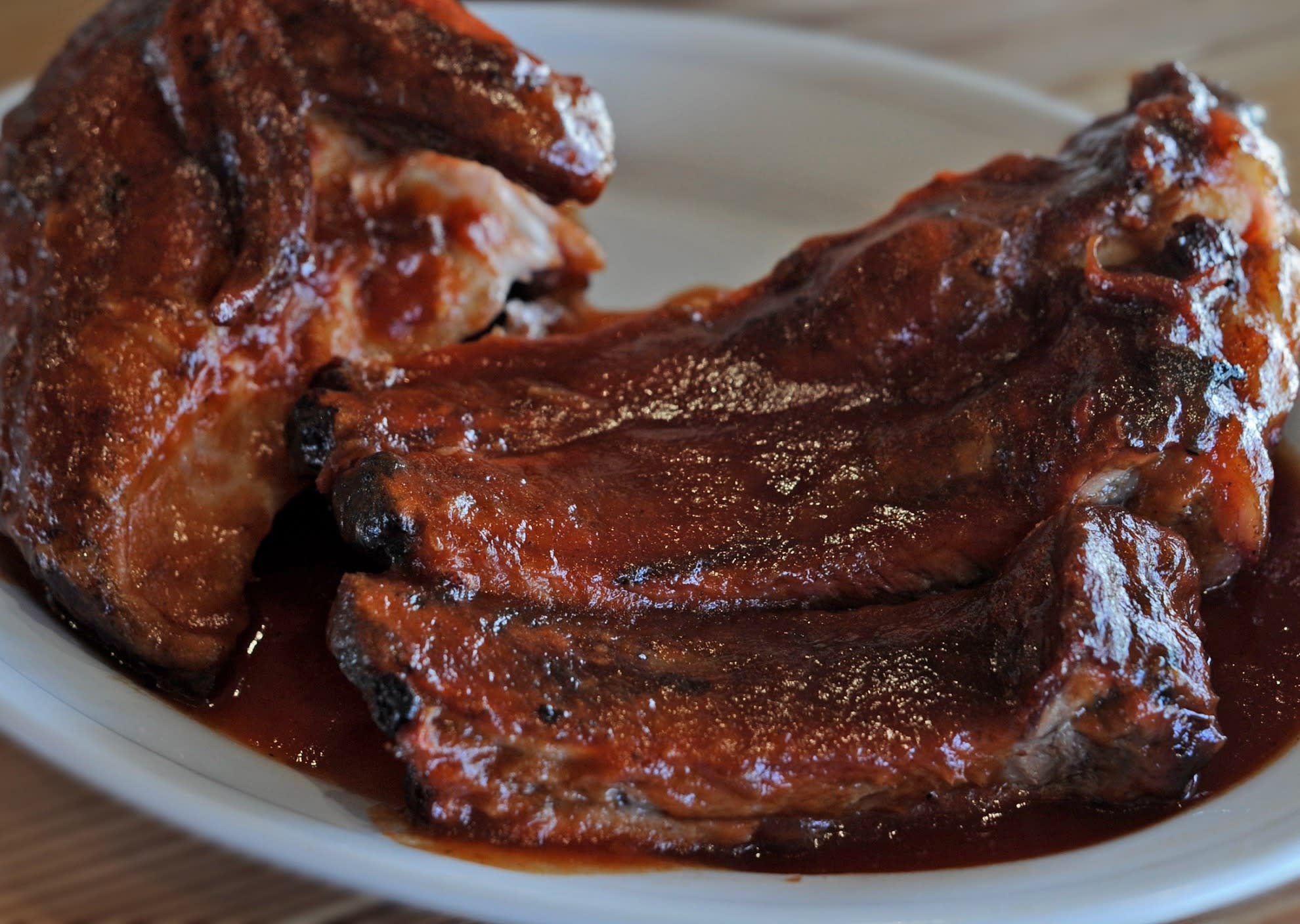 Plate of saucy ribs