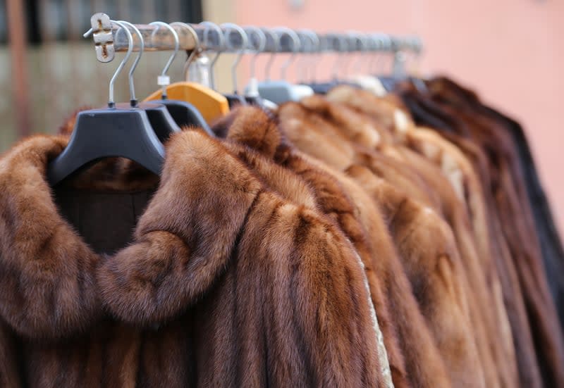 fur-coats-on-rack-getty