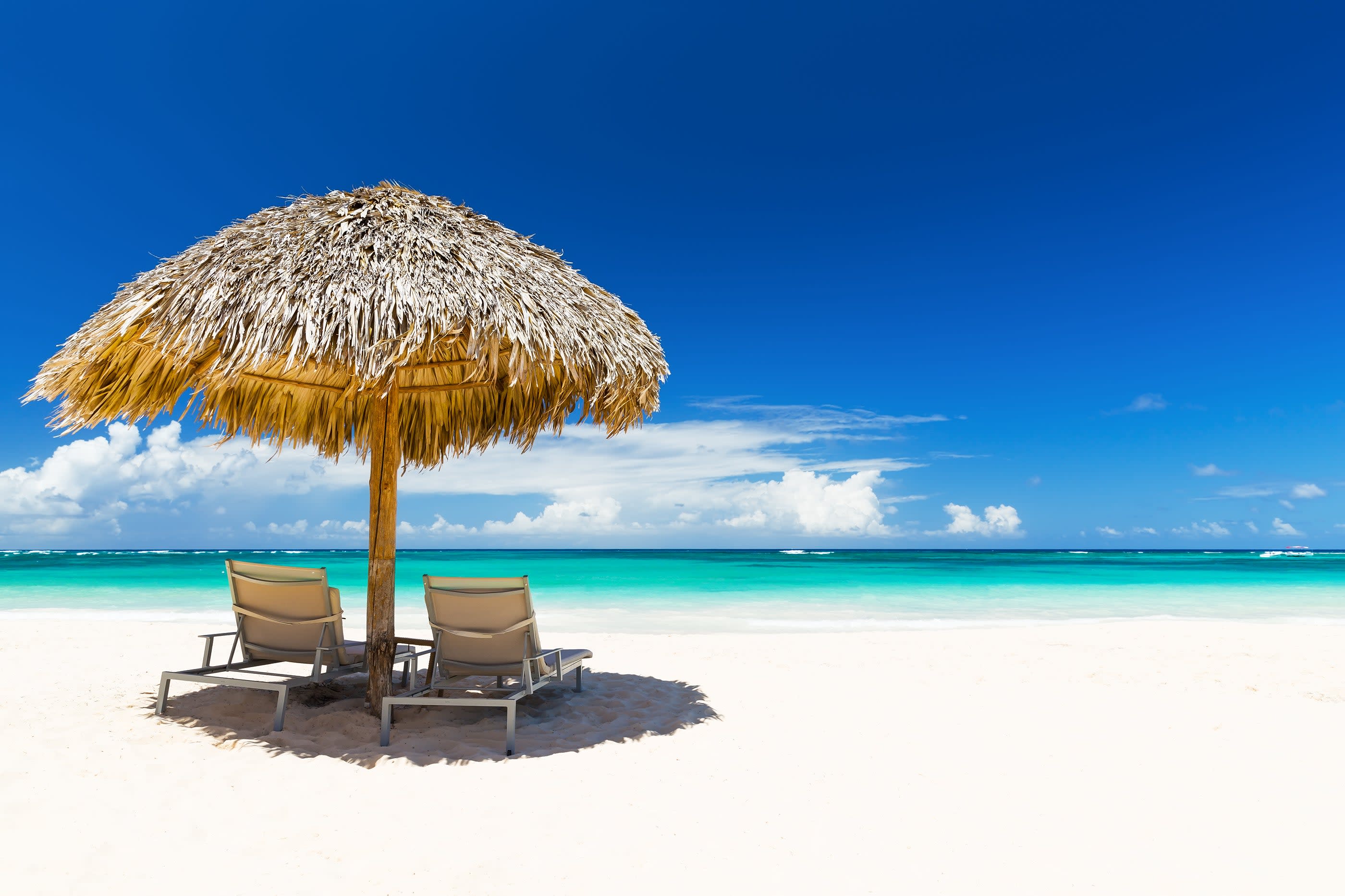 bigstock-Beach-Chairs-With-Umbrella-And-129286676