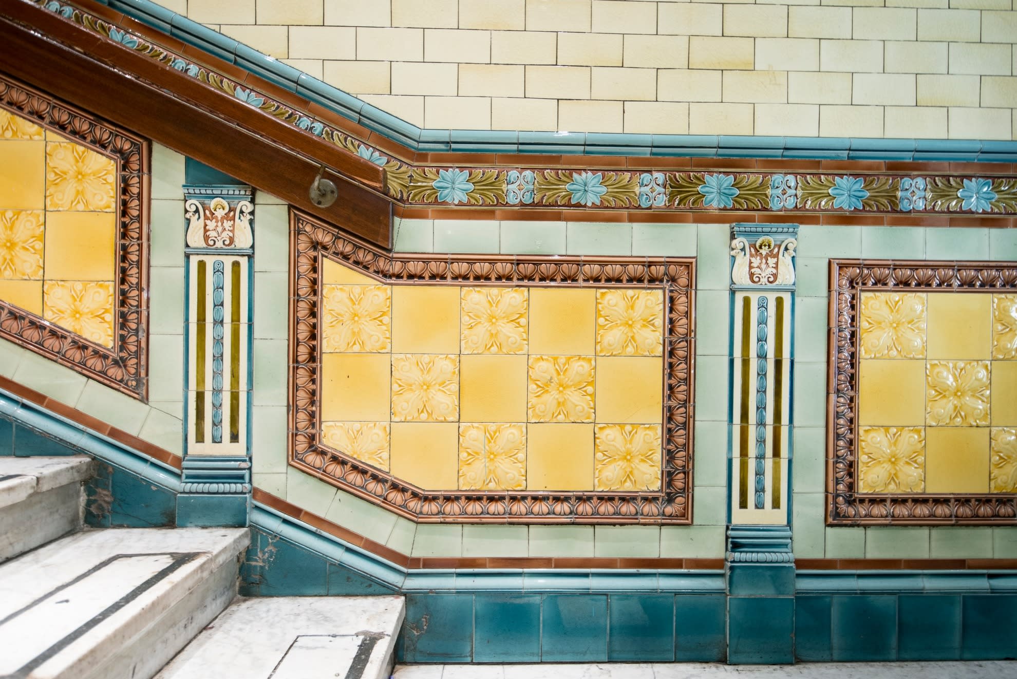 A colourful, tiled hallway floor