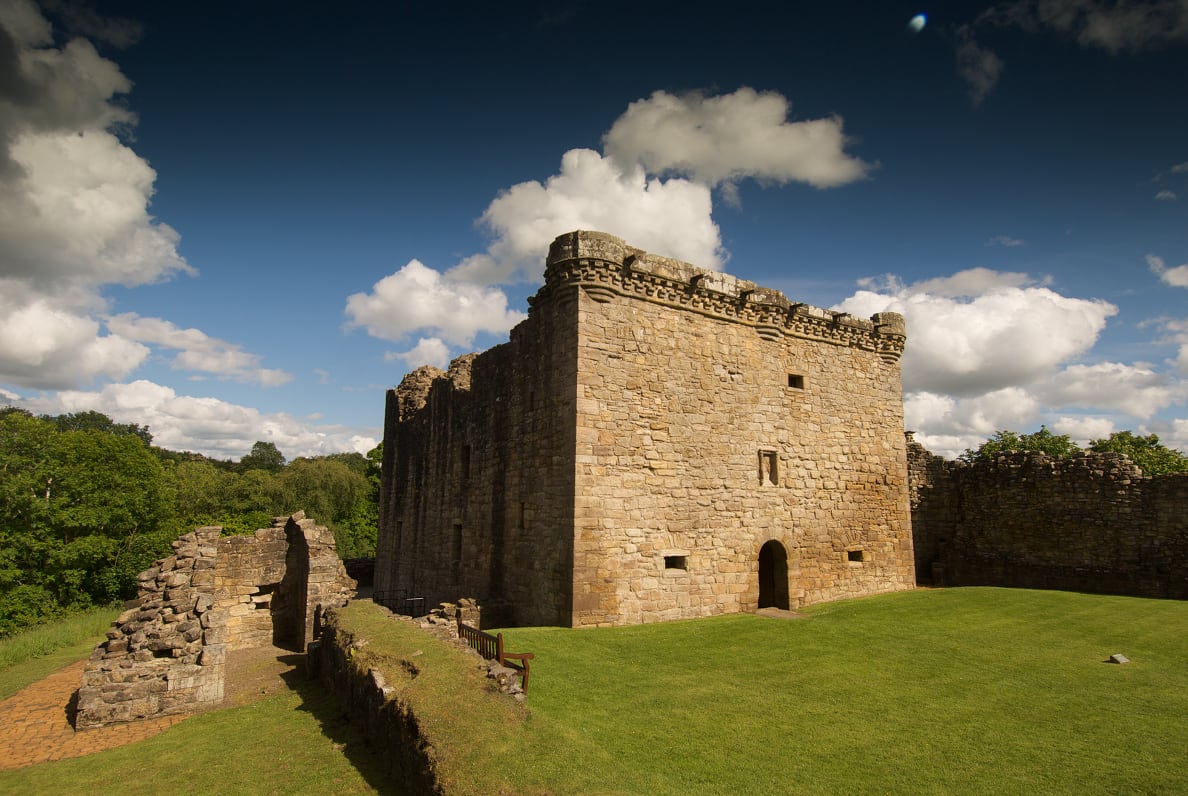 The exterior of a strong-looking stone castle