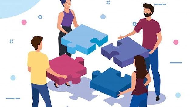 Gente de trabajo en equipo con piezas de rompecabezas _ Vector Gratis