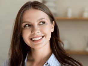 woman-posing-light-room-looking-260nw-2693216963
