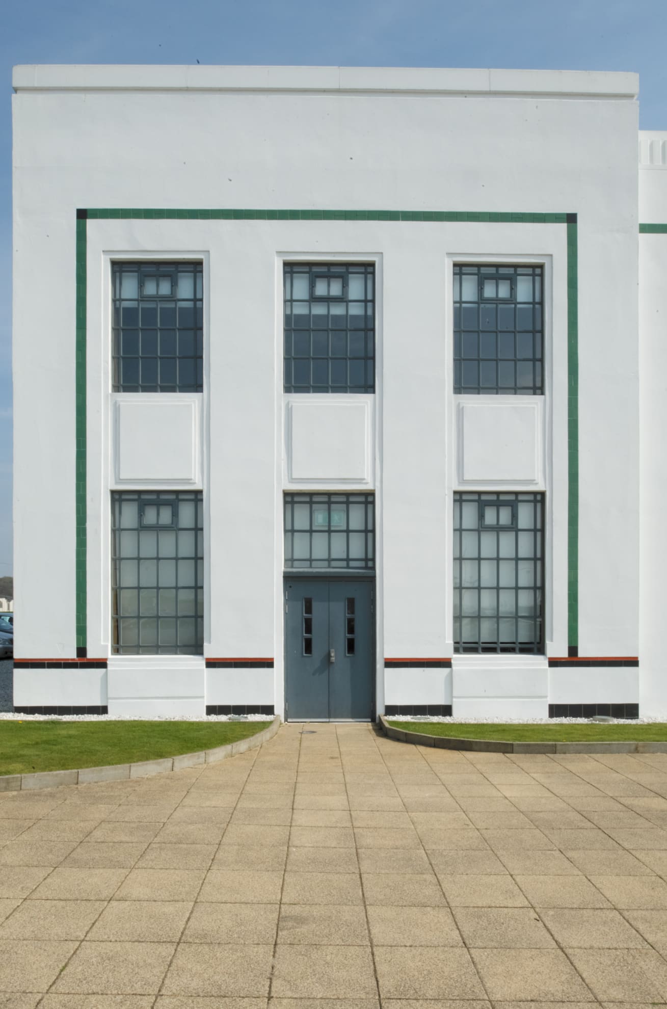 A large, square, detached Art Deco style building