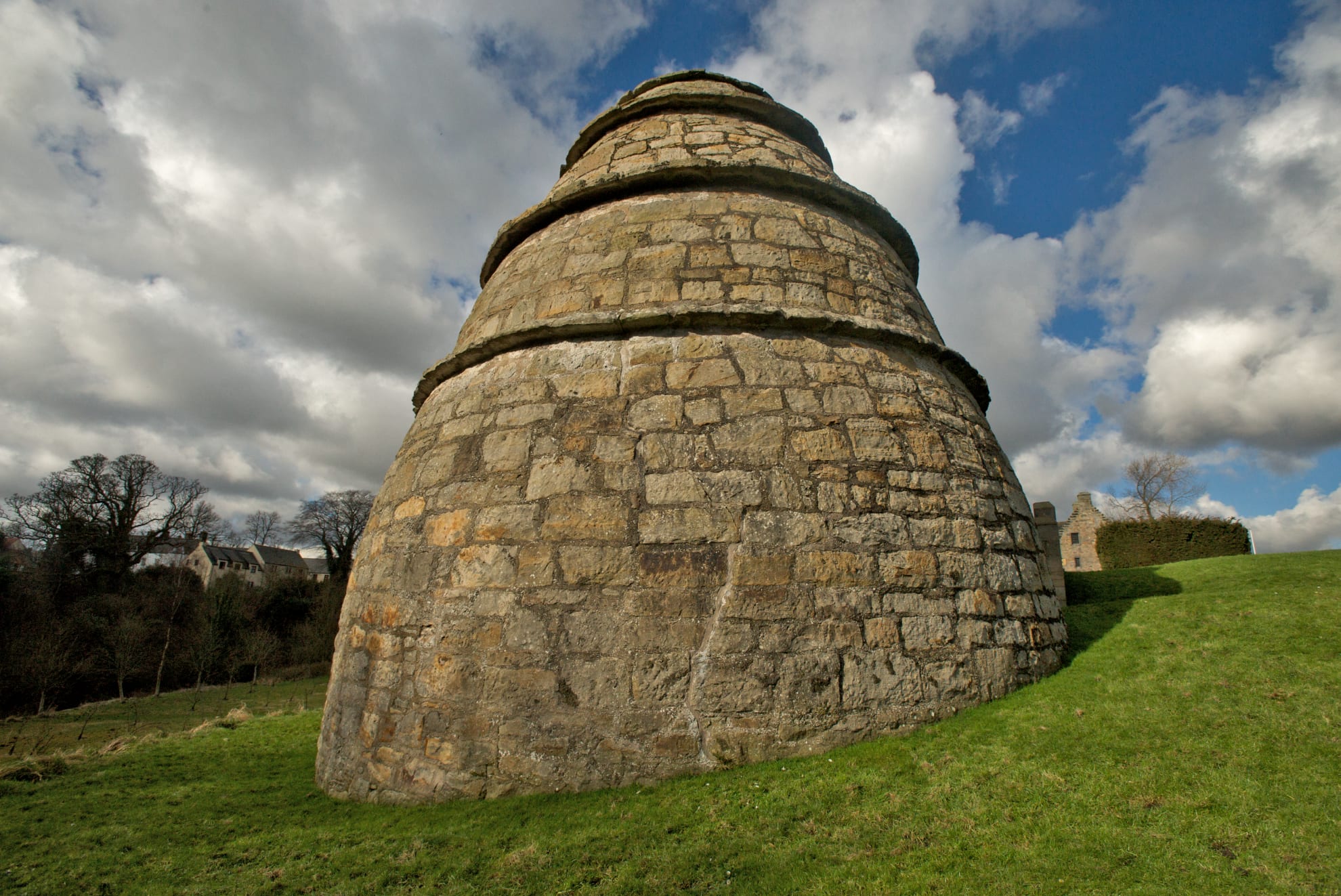 Bee hive shaped doocot in garden grounds.