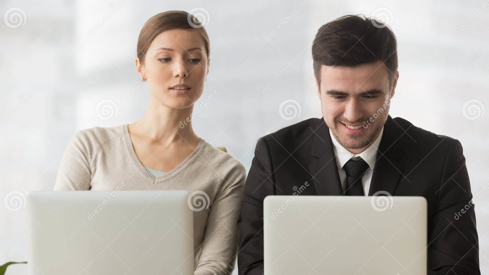 interested-curious-businesswoman-looking-businessman-laptop-s-corporate-spy-colleagues-spying-rival-cheating-examination-98503613