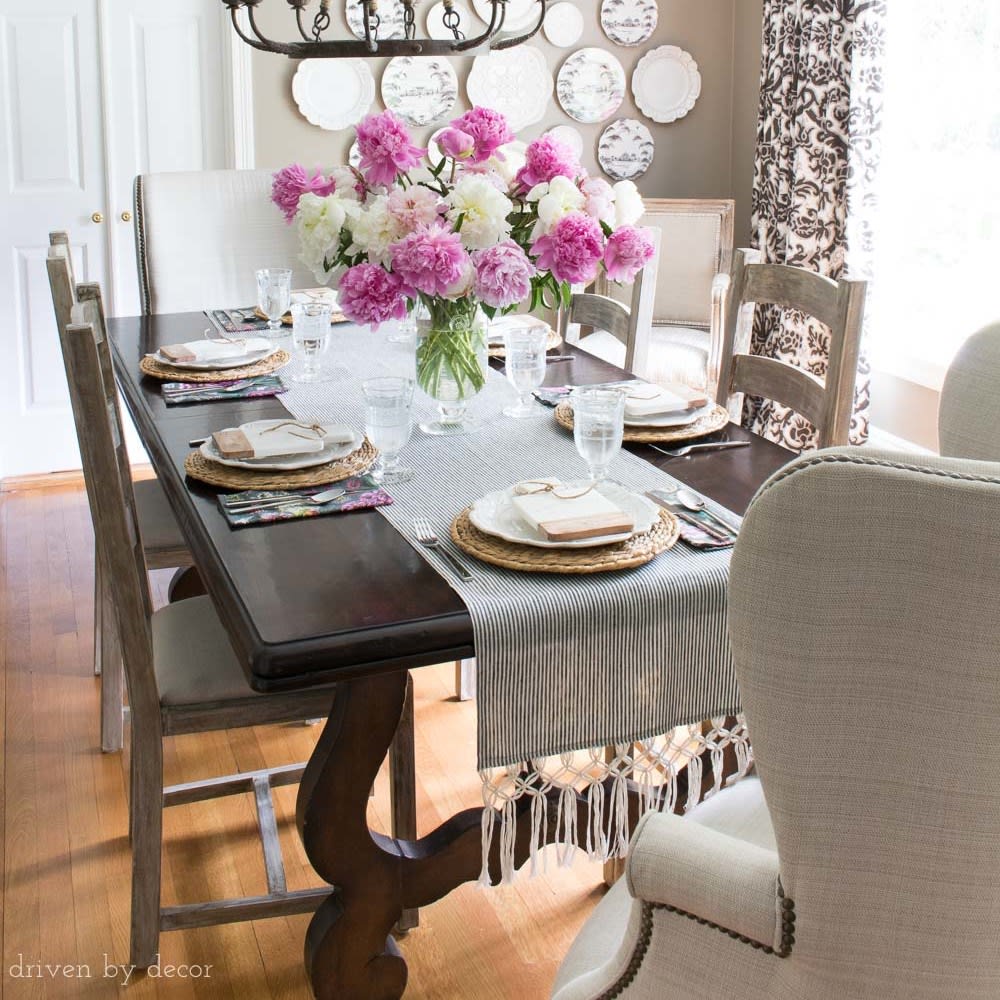 dark-gray-dining-room-wingback-ladderback-chairs-plate-wall