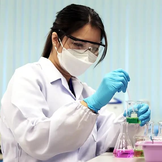 person-wearing-PPE-whilst-handling-chemicals