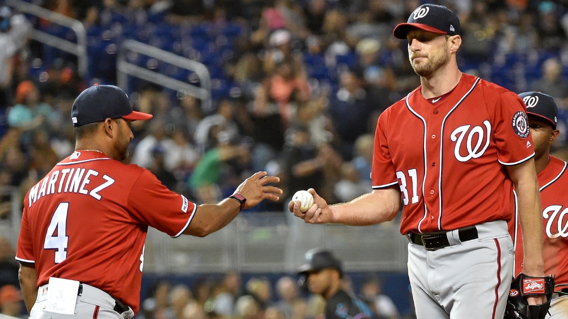 Davey Martinez and Max Scherzer