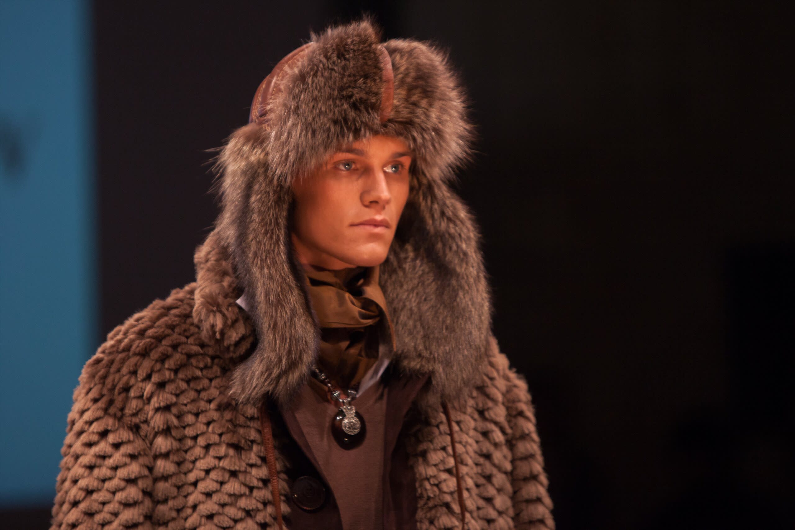 Moscow_VDNKh_male_model_presenting_fur_fashion_10656443305-scaled