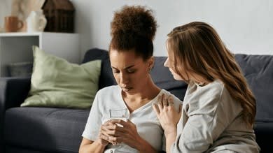 lesbian-couple-shares-tender-moment-260nw-2471635135