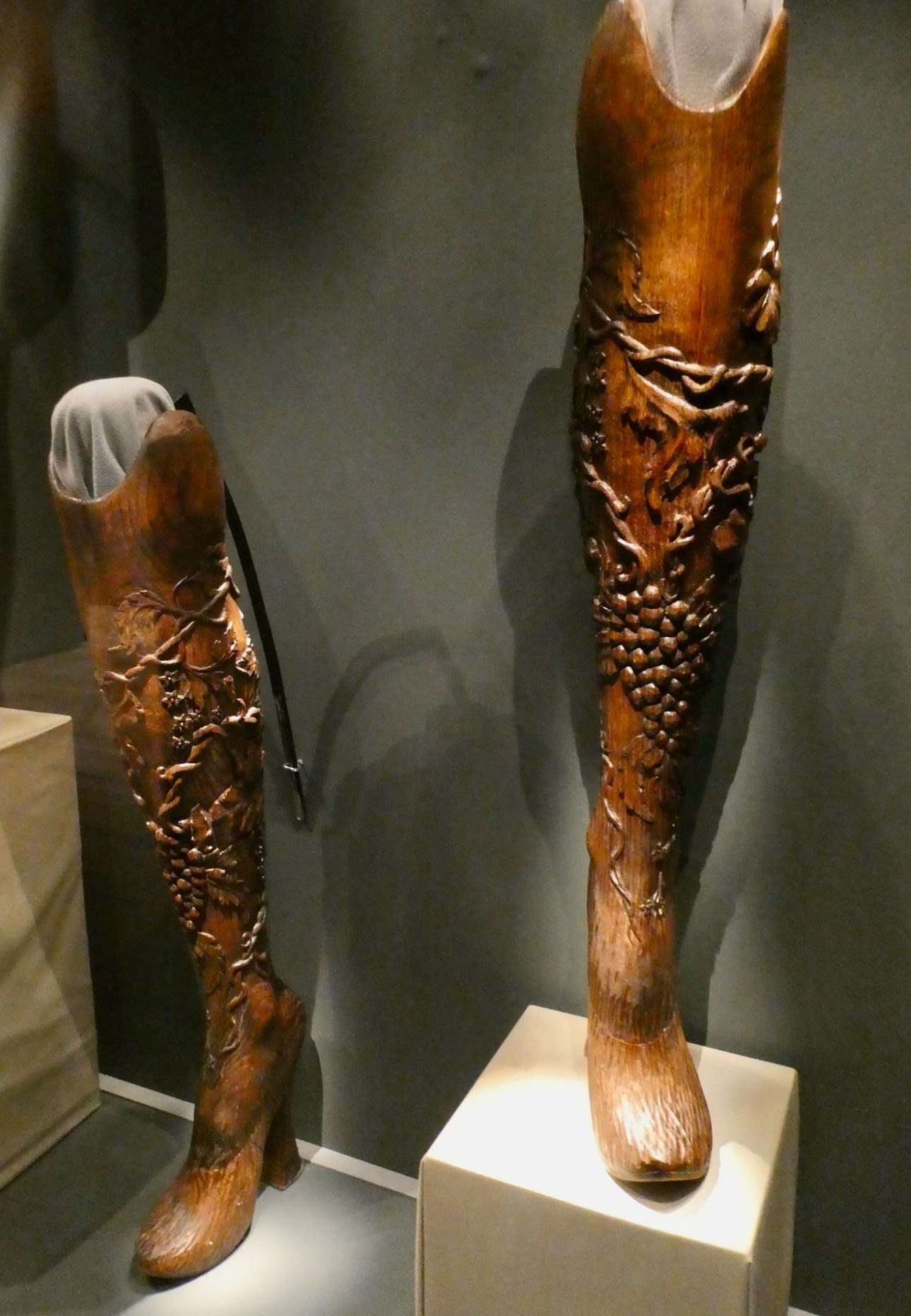 Image of wooden carved prosthetic legs