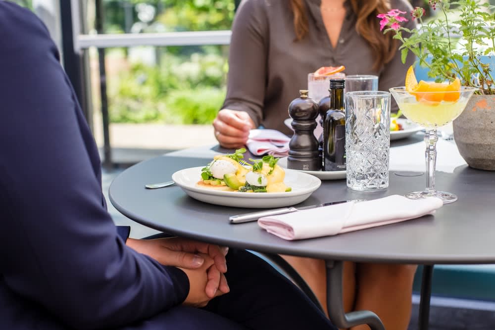 One-on-one conversation at restaurant